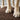Dog's muddy paw prints captured by the anti-mud absorbent doormat.